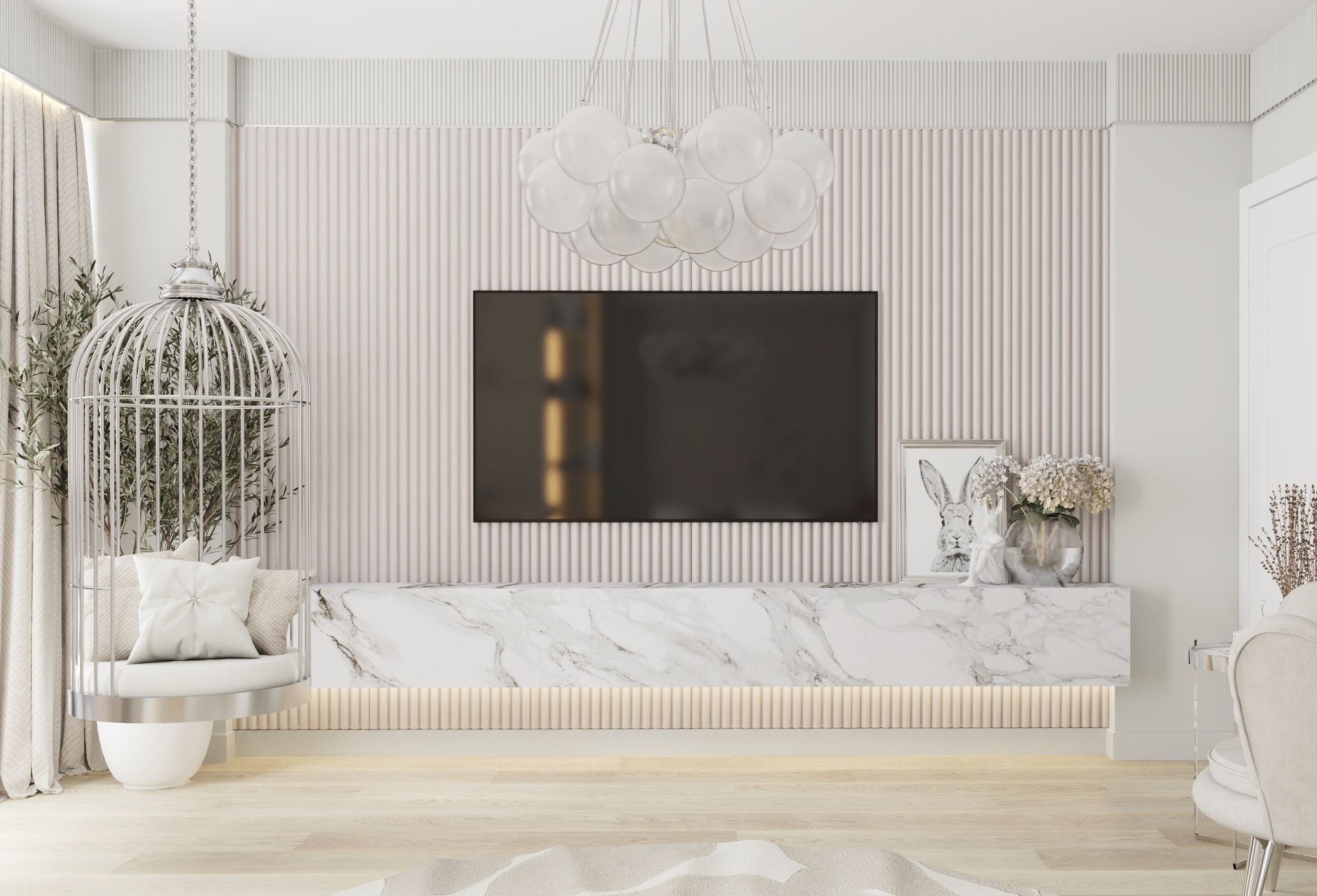 Elegancki salon z marmurową szafką RTV pod wiszącym telewizorem, dekorowany lampą-klatką i grafiką z królikiem. Stonowana kolorystyka, nowoczesny design.