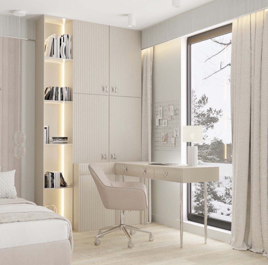 Beżowa szafa wnękowa z biurkiem i regałem w pokoju. Na szafkach dekoracyjne uchwyty w kształcie motyli. Za oknem zimowy krajobraz.