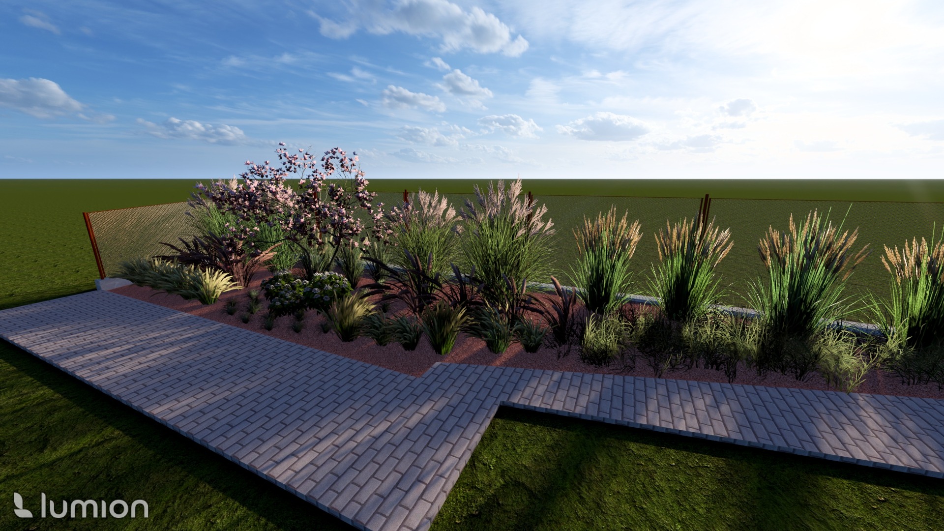 Wizualizacja rabaty kwiatowej z kwitnącymi krzewami i trawami ozdobnymi, oddzielonej ścieżką z kostki brukowej. W tle siatka ogrodzeniowa i zieleń.