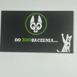 Czarno-zielona grafika z napisem 'Do ZOObaczenia...', stylizowanym logo zwierzęcia w okręgu i sylwetką psa z podniesioną łapą, całość na szarym tle.