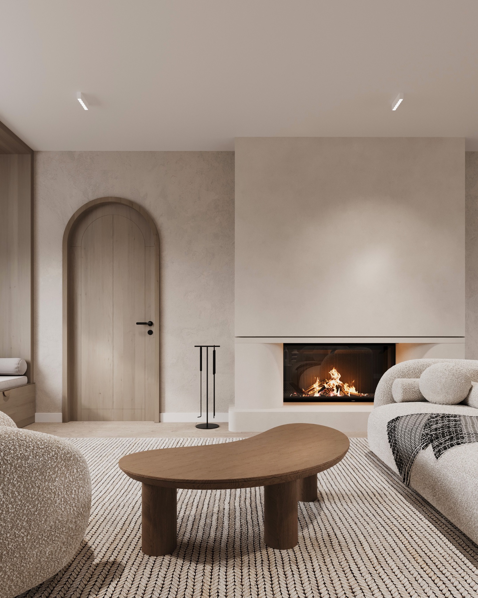 Beżowe wnętrze salonu z kominkiem, drewnianym stolikiem kawowym i teksturowaną sofą. Łukowe drzwi i minimalistyczne oświetlenie.