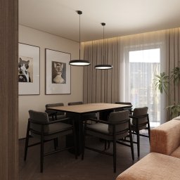 GAMKO+PARTNERS Sp. z o.o. - Stylowa jadalnia w Warszawie: drewniany stół z sześcioma krzesłami, minimalistyczne lampy wiszące, obrazy z motywem zwierzęcym i rośliny doniczkowe.