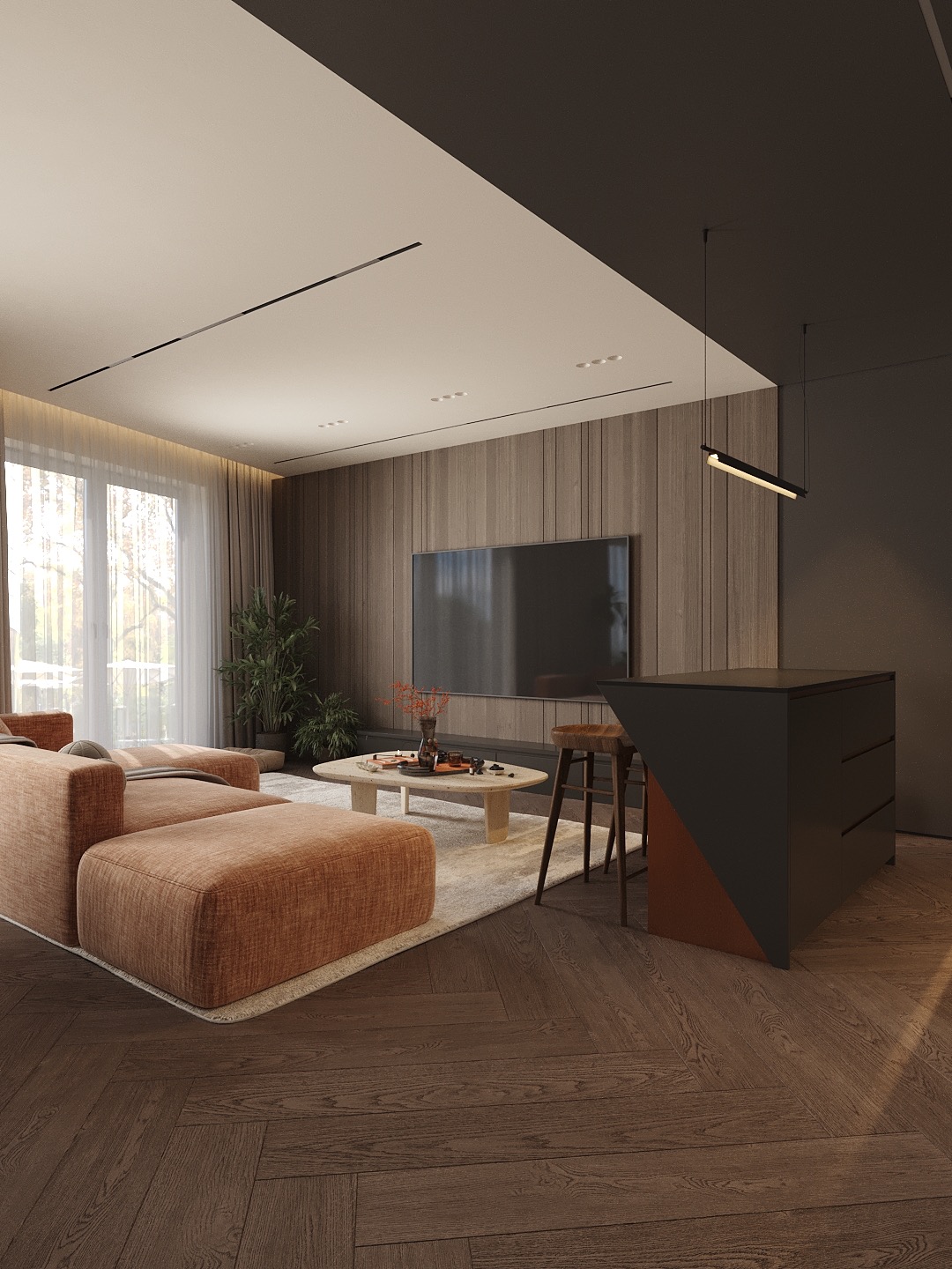 Wnętrze salonu z drewnianą podłogą w jodełkę. Pomarańczowa sofa modułowa, stolik kawowy i wyspa kuchenna z hokerem. Minimalistyczne oświetlenie.