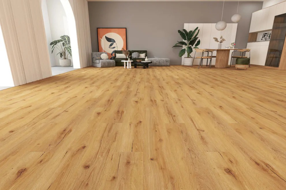 Jasne, drewniane panele podłogowe w przestronnym salonie z elementami wystroju w stylu skandynawskim. Widok na salon z sofą, stolikiem kawowym i roślinami.