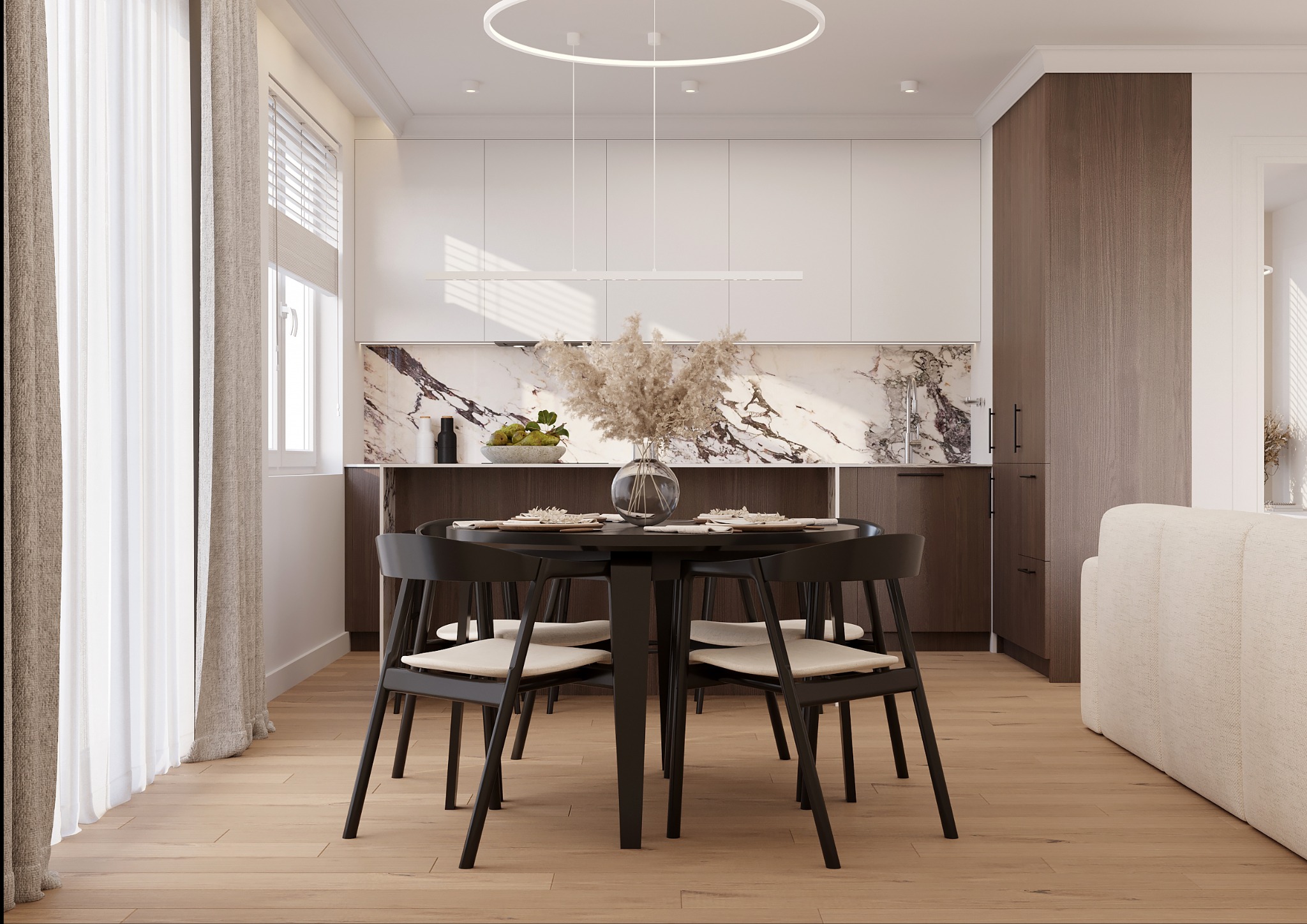 Jadalnia w nowoczesnym stylu: okrągły stół z czarnymi krzesłami na tle marmurowej ściany i białych szafek kuchennych. Minimalistyczna lampa sufitowa.