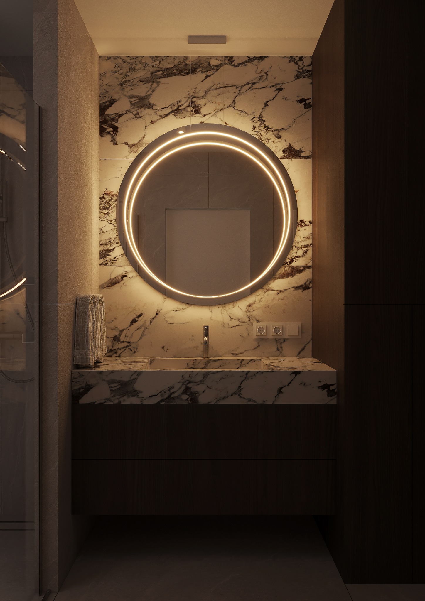 Elegancka łazienka z okrągłym lustrem LED, marmurowym blatem i ciemnymi drewnianymi szafkami. Nowoczesny design z subtelnym oświetleniem.