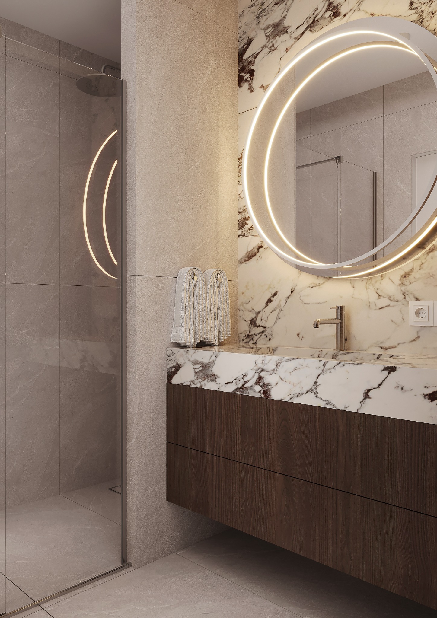 Nowoczesna łazienka z marmurową umywalką, okrągłym lustrem z podświetleniem LED i kabiną prysznicową. Minimalistyczny design, eleganckie wykończenie.