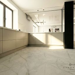 EWA CISZEWICZ-KRITSCHGAU Studio Projektowe Wnętrz Evahause- Luxury - Nowoczesna kuchnia z beżowymi szafkami, marmurową podłogą i minimalistycznym oświetleniem. Widok z poziomu podłogi podkreśla przestronność wnętrza.