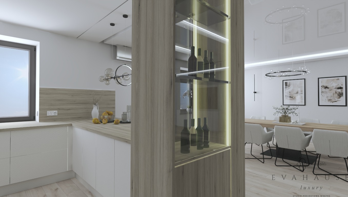 Nowoczesna kuchnia z jadalnią w neutralnych barwach. Zabudowa kuchenna z przeszkloną witryną na wino. Stół jadalny z krzesłami i dekoracjami. Minimalistyczne oświetlenie.