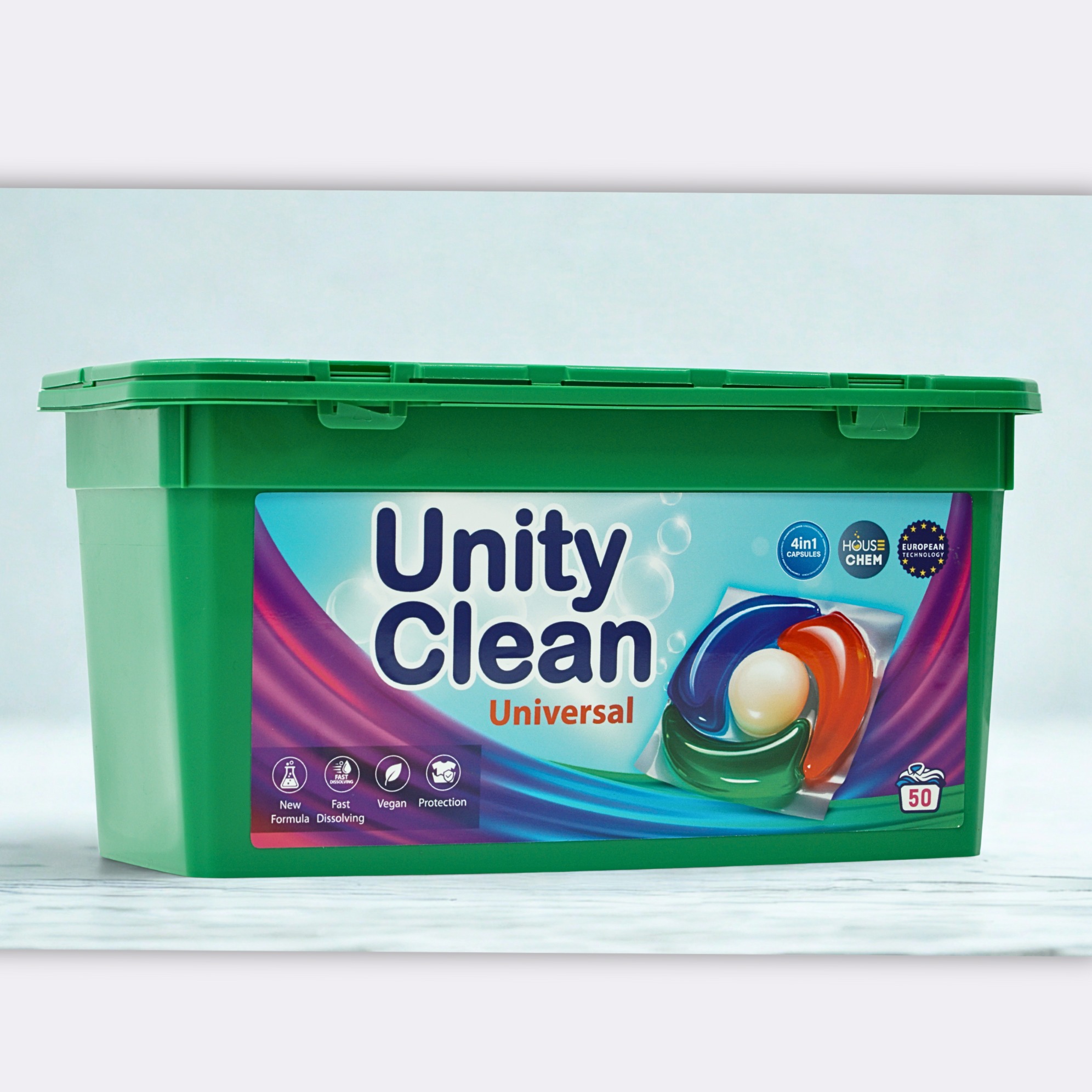 Pojemnik zielony z kapsułkami do prania Unity Clean Universal. Kapsułki 4w1, szybkie rozpuszczanie, wegańskie, ochrona. Opakowanie zawiera 50 sztuk.