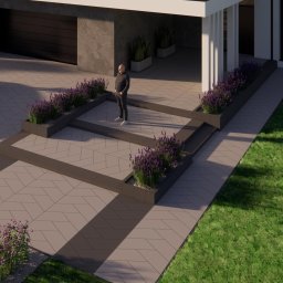 Cobblestone sp.z.o.o. - Nowoczesny podjazd z geometrycznym wzorem kostki, rabatami z lawendą i figurą człowieka, w stonowanej kolorystyce z elementami zieleni trawnika.