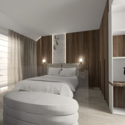 MOCHO STUDIO MONIKA MACHOWSKA-ALEKSANDROWICZ - Wizualizacja sypialni z drewnianą ścianą, białym łóżkiem i pufą. Na półce biało-drewnianego regału stoi czarny ptak. Stonowana kolorystyka, naturalne światło.