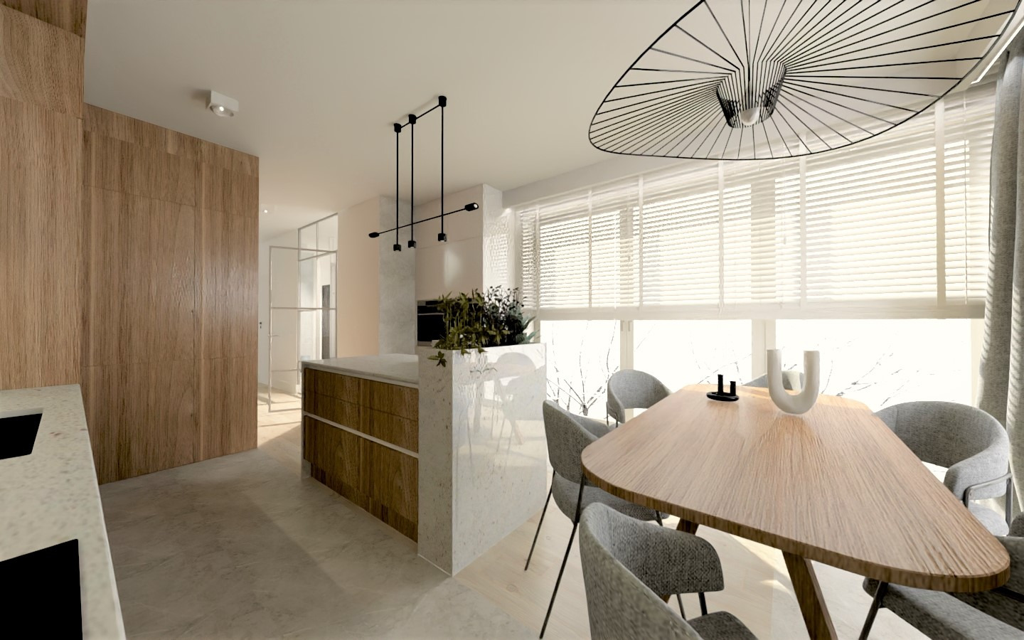 Jasna kuchnia z drewnianą zabudową i wyspą z marmurowym blatem, minimalistyczna lampa nad stołem z szarymi krzesłami, duże okno z żaluzjami.