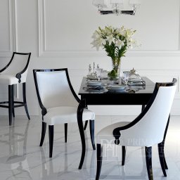 Stół Elena – rozkładany mebel glamour z giętymi nogami. Zachwyca czarnym połyskiem. Tworzymy go na indywidualne zamówienie. Wybierz dowolny rozmiar, kolor z palety RAL oraz wykończenie (mat, półmat, połysk).