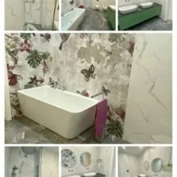 Nowoczesna łazienka z wanną, prysznicem, umywalkami na szafce w odcieniach zieleni, marmurowymi płytkami i ścianą z motywem kwiatowym i motyli.