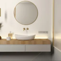 Minimalistyczna łazienka w bieli i drewnie: okrągłe lustro, umywalka nablatowa, złote detale armatury i oświetlenia LED. Nowoczesny design.