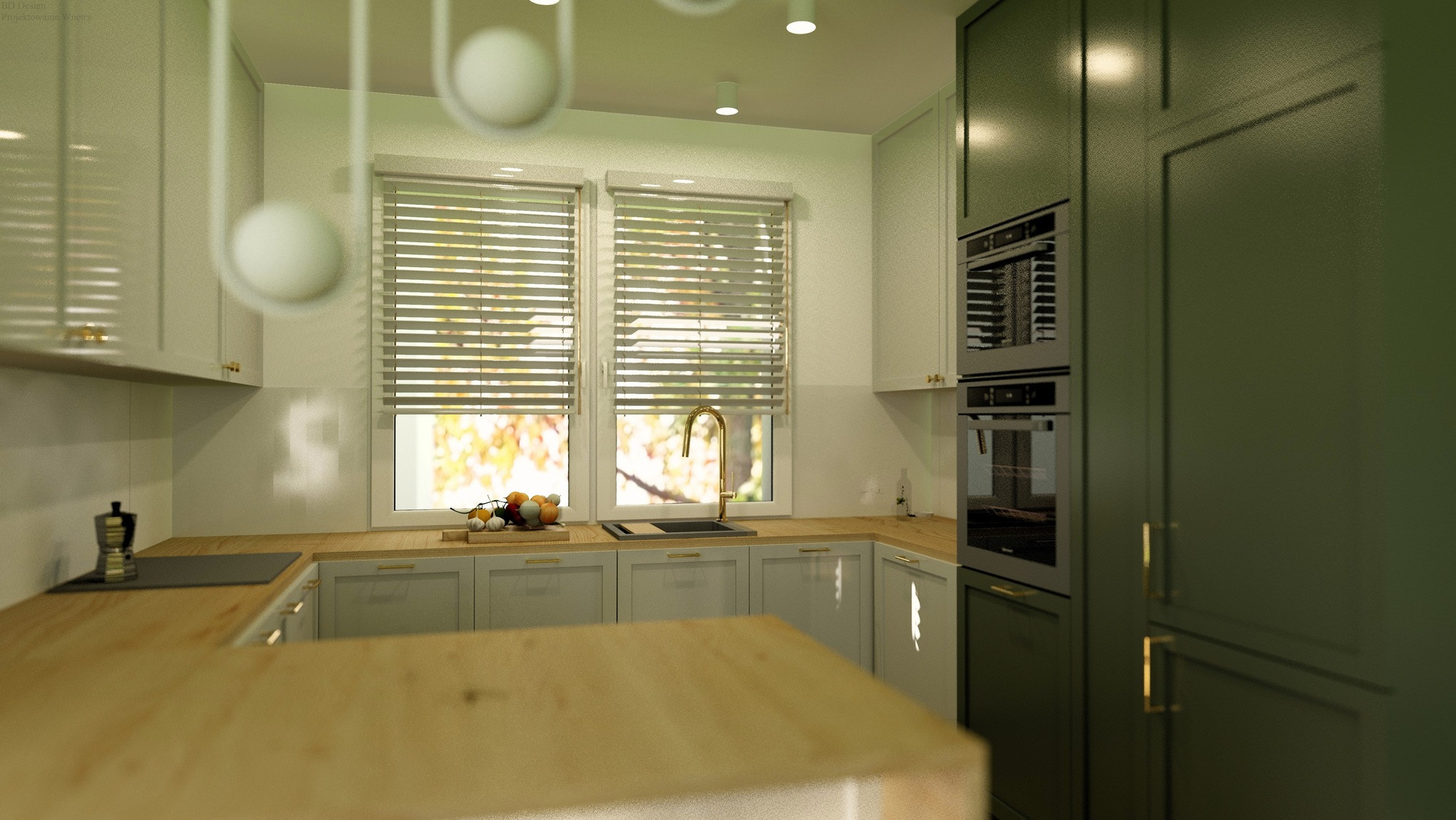 Wnętrze kuchni z oknami w żaluzjach, drewnianym blatem, białymi szafkami i zielonym wysokim zabudowaniem z piekarnikiem. Na blacie owoce i ekspres do kawy.