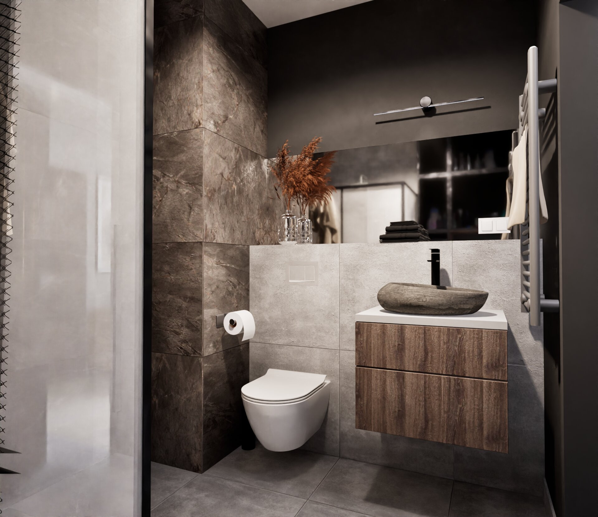 Nowoczesna łazienka z kamienną umywalką, brązowymi płytkami imitującymi marmur i minimalistyczną toaletą podwieszaną. W tle lustro i grzejnik drabinkowy.