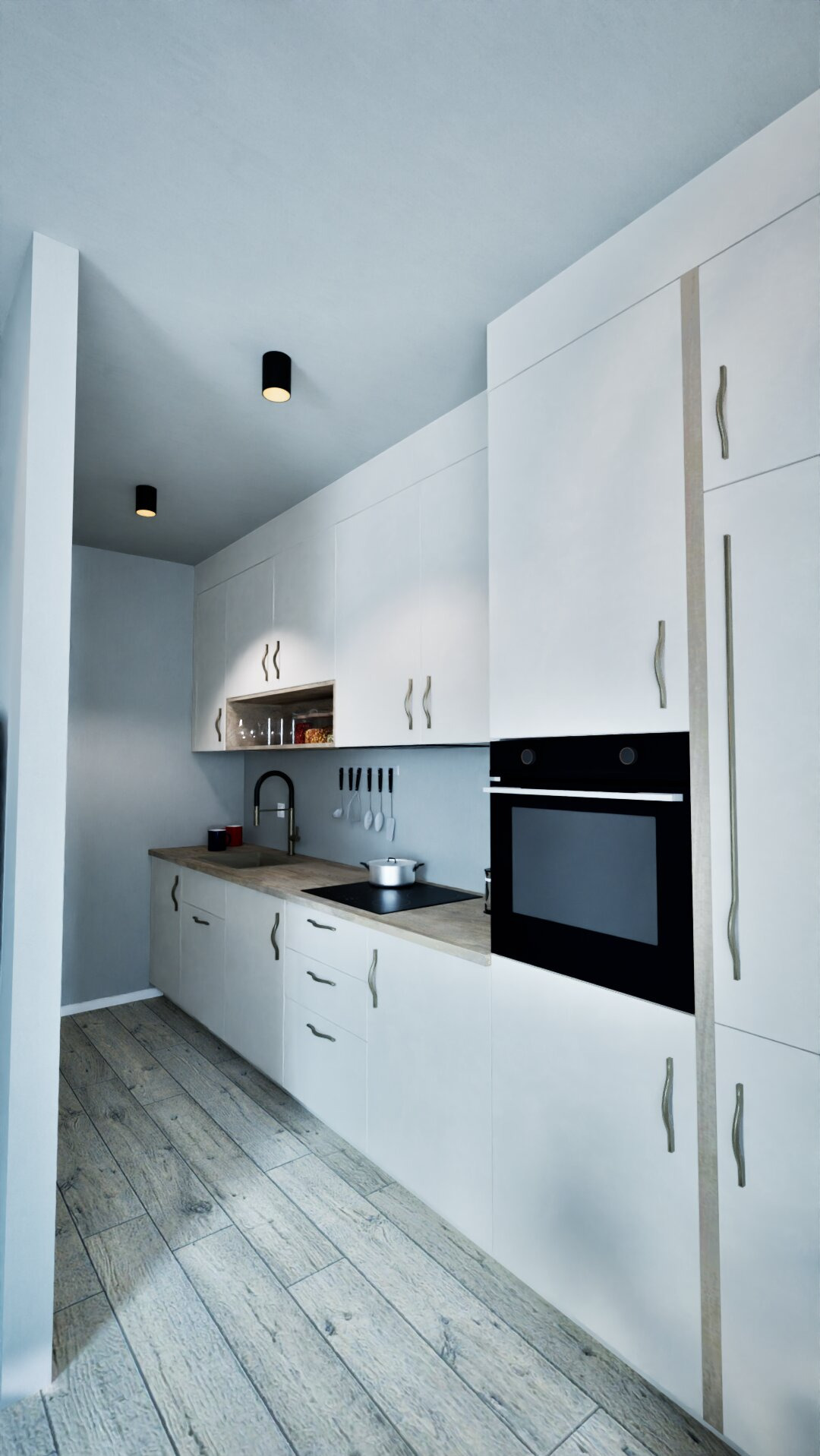 Nowoczesna, minimalistyczna kuchnia z białymi szafkami, drewnianym blatem i podłogą. Czarny piekarnik w zabudowie. Oświetlenie punktowe sufitowe.