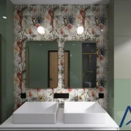 Nowoczesna łazienka z dwoma białymi umywalkami, lustrami w złotej ramie i tapetą w tropikalne motywy z papugami. Oświetlenie punktowe nad lustrami.