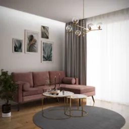 Stylowy salon z narożną sofą w odcieniach różu, marmurowymi stolikami kawowymi ze złotymi nogami i okrągłym szarym dywanem. Na ścianie grafiki z motywami roślinnymi.