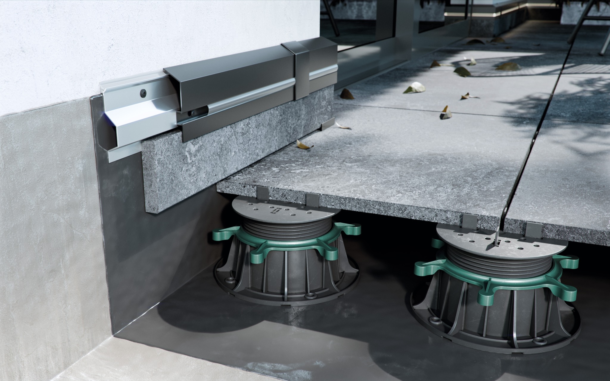 Szary taras wentylowany z płyt kamiennych, wsparty na regulowanych wspornikach z zielonymi akcentami, widoczne detale montażu przy ścianie.