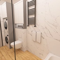 Robert Potoczny - Nowoczesna łazienka z marmurowymi płytkami, drewnianą podłogą, podwieszaną toaletą i grzejnikiem drabinkowym. Widoczna pralka w zabudowie i umywalka nablatowa.