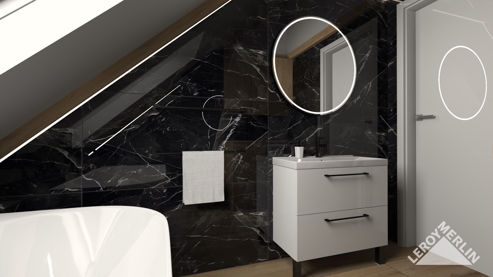Nowoczesna łazienka na poddaszu z czarnymi płytkami imitującymi marmur, okrągłym lustrem z podświetleniem LED i białą szafką pod umywalkę.