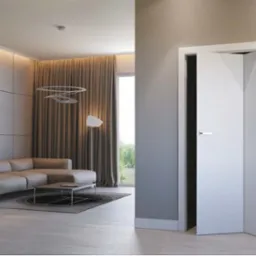 Nowoczesne, białe drzwi wewnętrzne z geometrycznym wzorem, lekko uchylone, widoczne w eleganckim salonie z szarą sofą i designerską lampą.