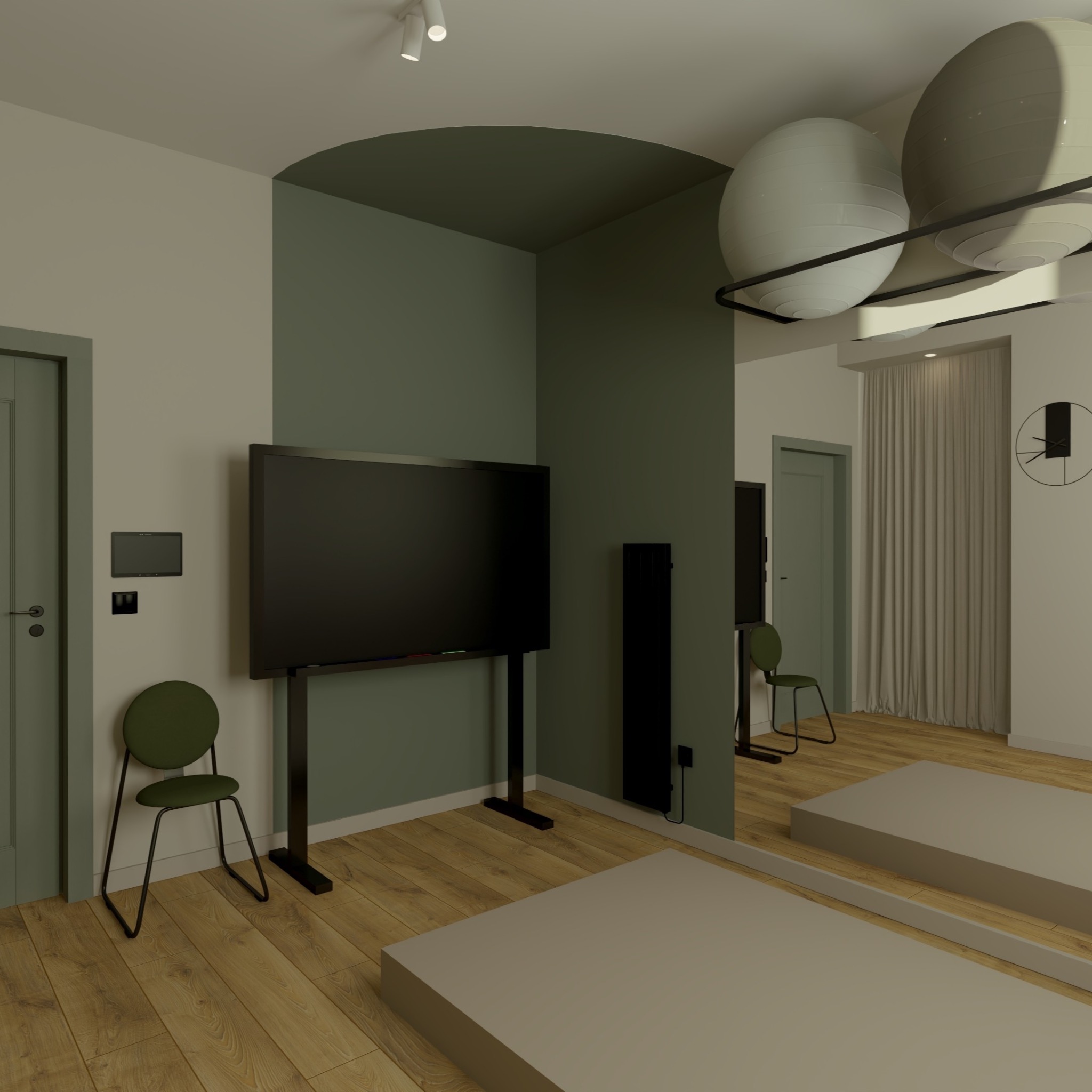 Wnętrze gabinetu z dużym ekranem, krzesłem w odcieniach zieleni i elementami wyposażenia rehabilitacyjnego, jak piłki. Stonowana kolorystyka i minimalistyczny design.