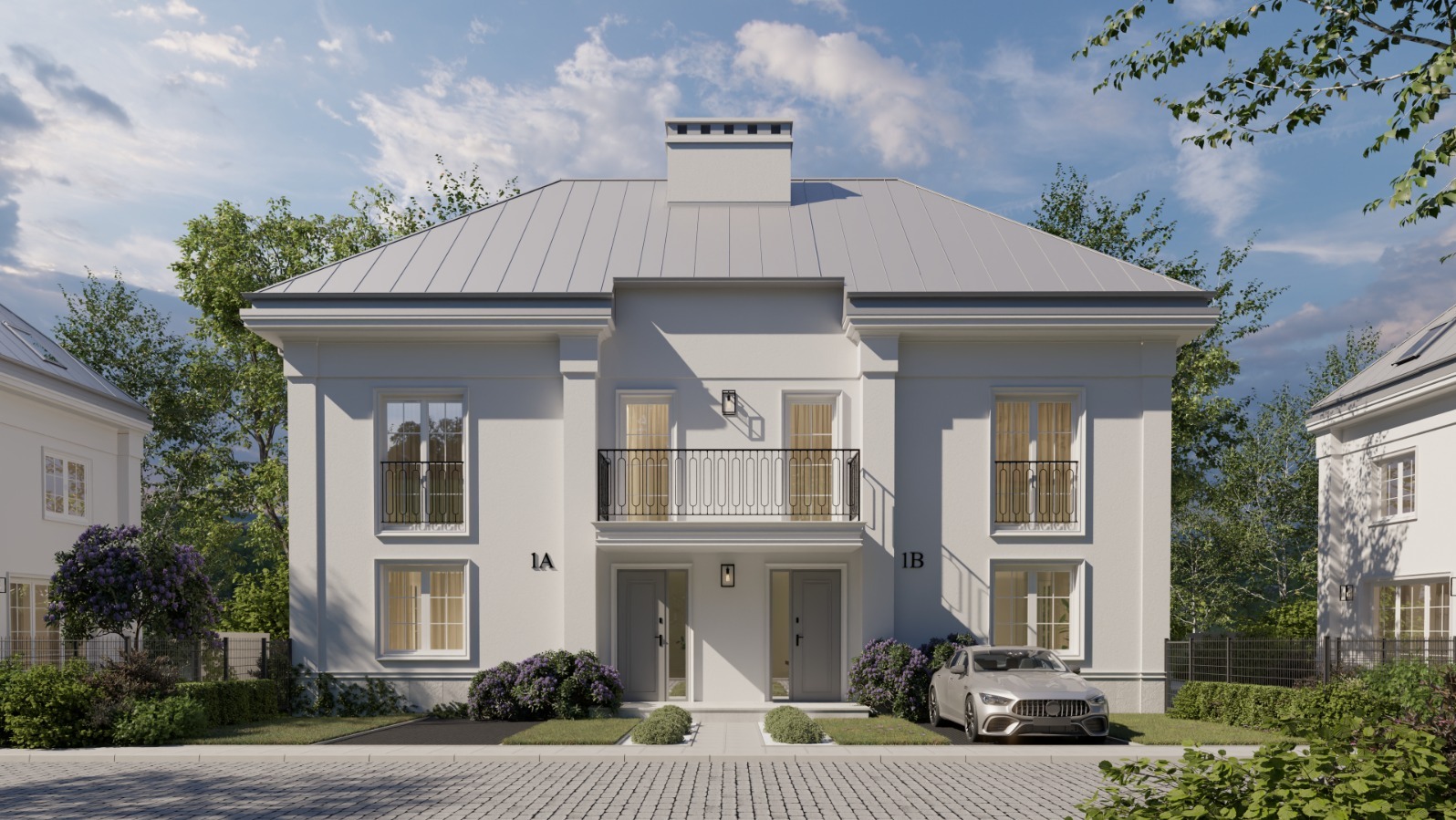 Elewacja dwukondygnacyjnego domu bliźniaczego z balkonem i szarym dachem, z numerami 1A i 1B, otoczona zielenią i brukowanym podjazdem, z zaparkowanym samochodem.