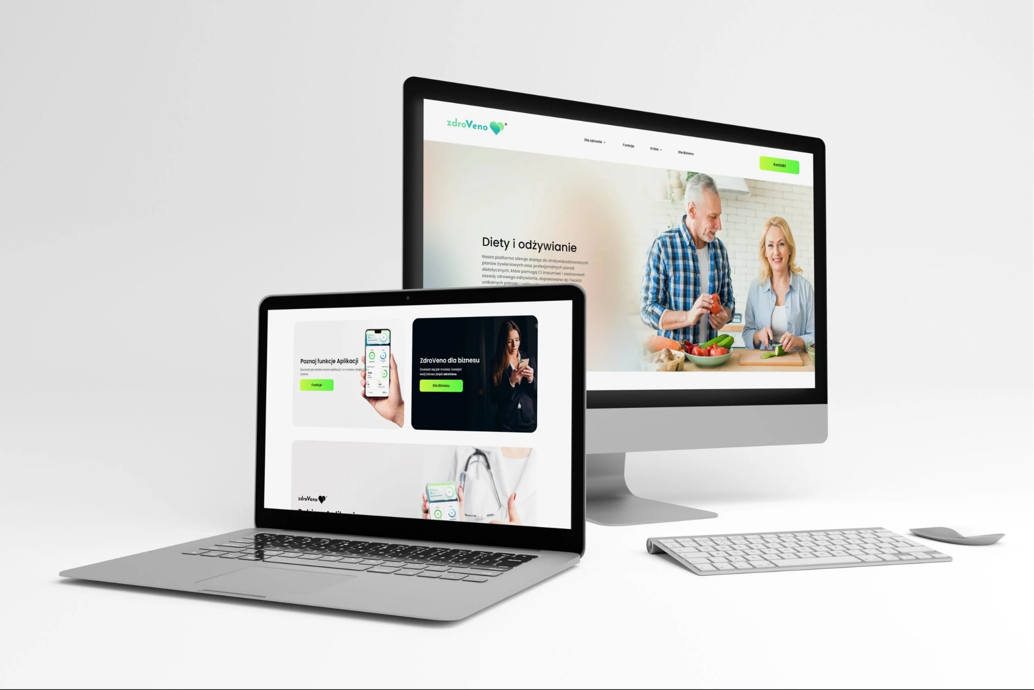 Prezentacja strony www 'ZdroVeno' na laptopie i monitorze. Strona dotyczy diet i odżywiania, z aplikacją mobilną. Widoczny interfejs użytkownika i logo.
