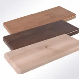 Trzy próbki parapetów z konglomeratu w odcieniach brązu i beżu, ułożone kaskadowo na jasnym tle. Widoczne różne wykończenia i kolory.