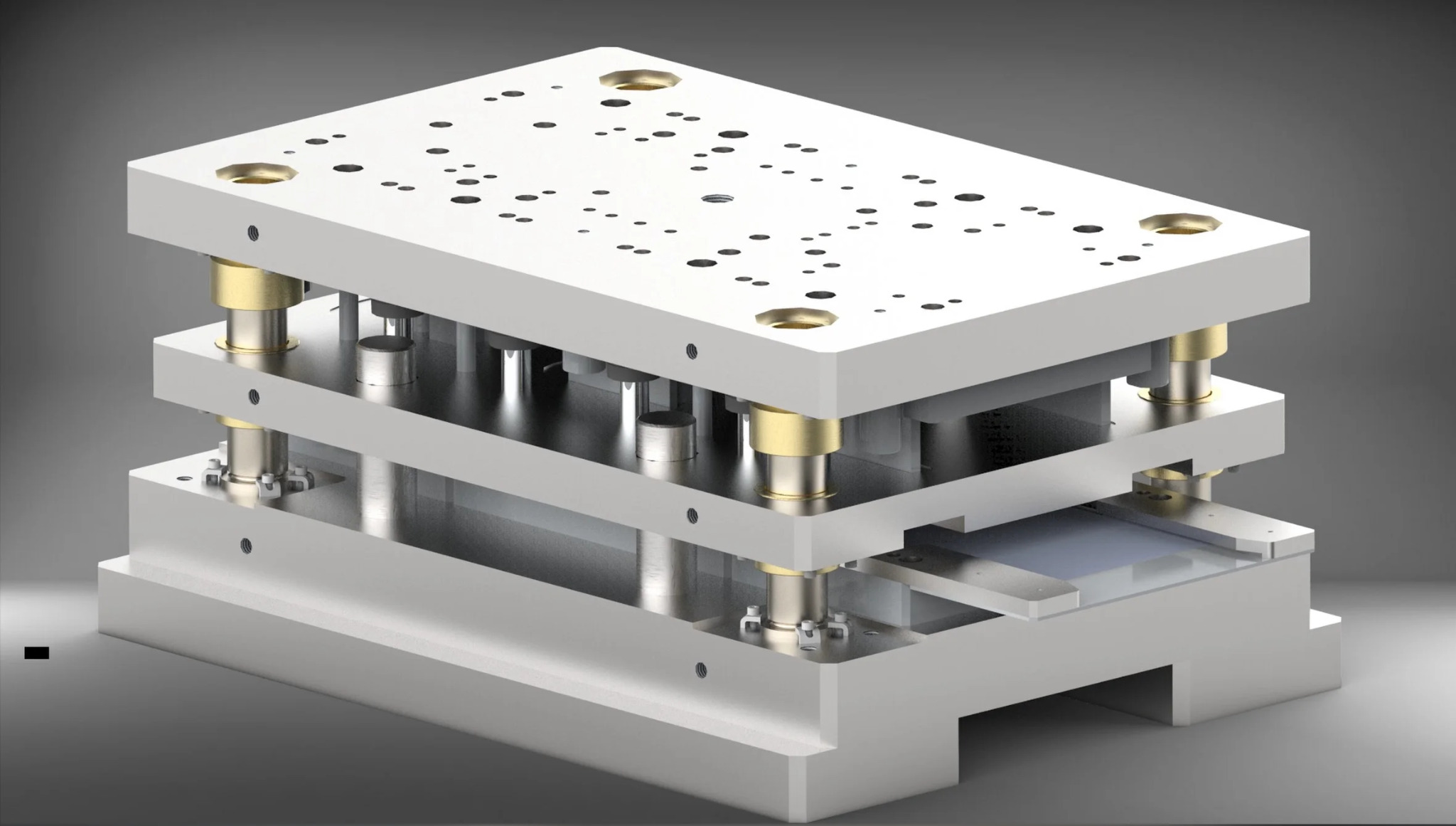 Wieloetapowa matryca wykrojnika, z widocznymi stemplami i prowadnicami, na szarym tle. Model 3D prezentuje precyzję wykonania i skomplikowaną konstrukcję narzędzia.