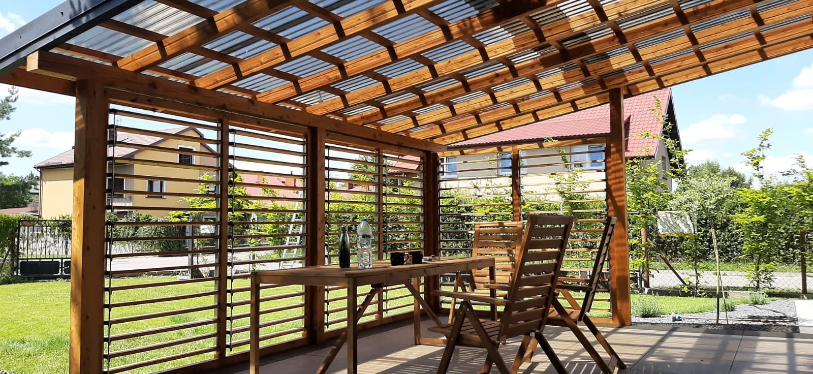 Zadaszenie tarasowe, z poliwęglanem i ruchomymi deseczkami