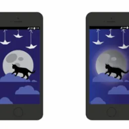 Dwa smartfony z identycznym, graficznym tłem: czarny kot na chmurach pod księżycem i origami w nocnym krajobrazie. Ilustracja na ekranie urządzenia mobilnego.