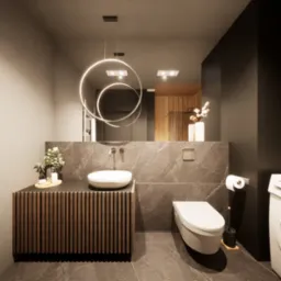 Nowoczesna łazienka z umywalką na szafce z lamelami, toaletą podwieszaną i okrągłymi lampami. Marmurowe płytki i minimalistyczny design.