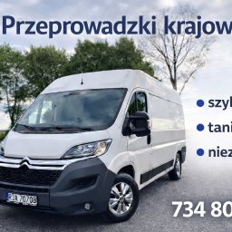 EkoMieszkanie - Biały bus Citroen z napisem 'Przeprowadzki krajowe' na tle zieleni, z hasłami 'szybko, tanio, niezawodnie' i numerem telefonu. Reklama firmy przeprowadzkowej.