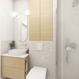 Zuzanna Rybicka Sikora Architekt Wnętrz - Nowoczesna łazienka z drewnianymi szafkami, umywalką nablatową i owalnym lustrem podświetlanym kulistymi lampami. Kabina prysznicowa ze srebrną armaturą.