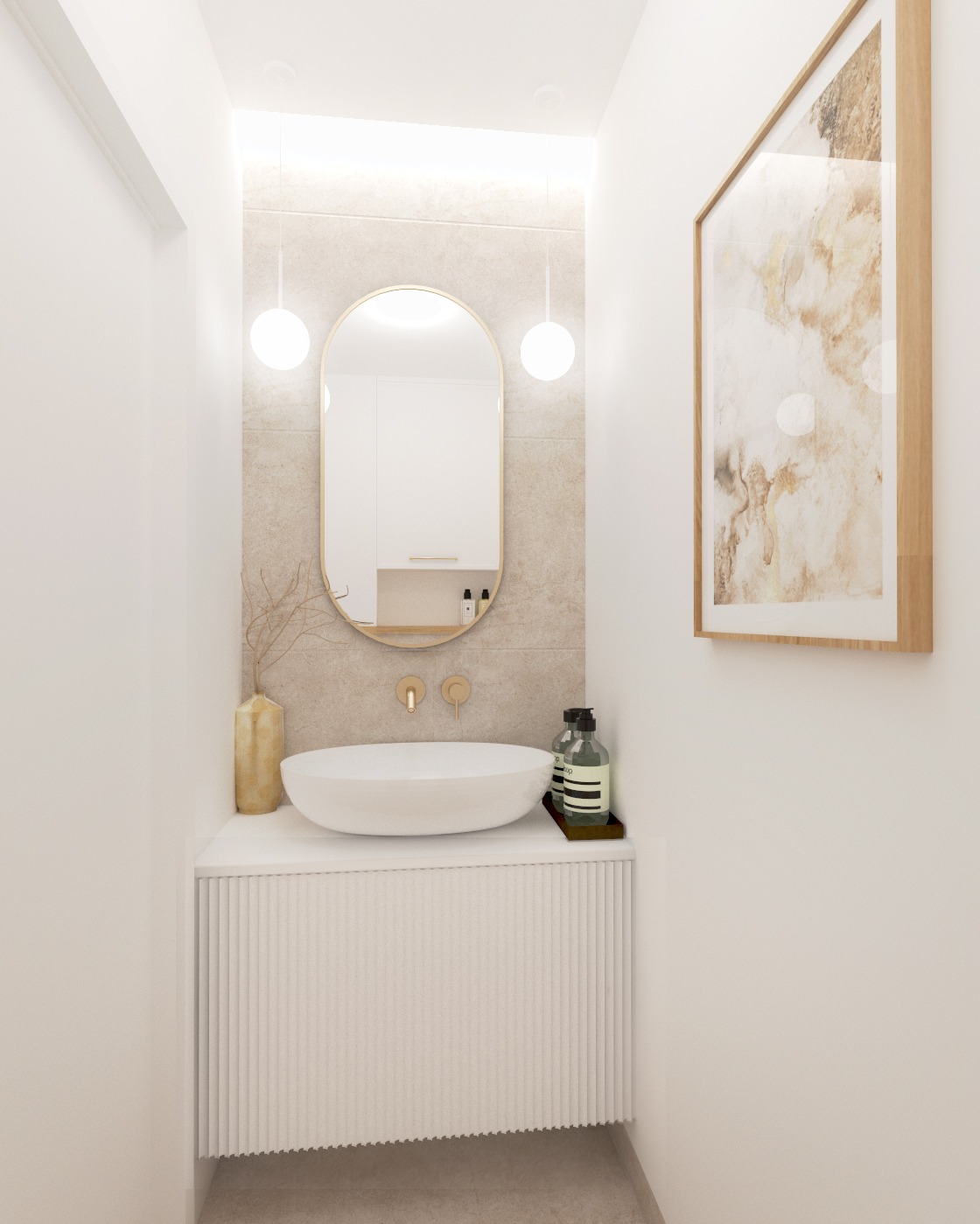 Minimalistyczna łazienka: owalne lustro z oświetleniem, umywalka nablatowa na szafce z ryflowanym frontem, beżowe płytki, złote akcenty i abstrakcyjny obraz w ramie.