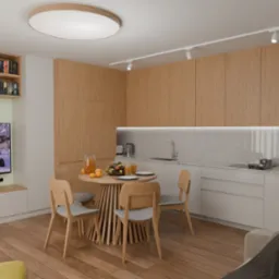 Jasna kuchnia z drewnianymi szafkami, okrągłym stołem i krzesłami. Na ścianie telewizor z bajką 'Kraina Lodu'. Nowoczesne oświetlenie sufitowe.