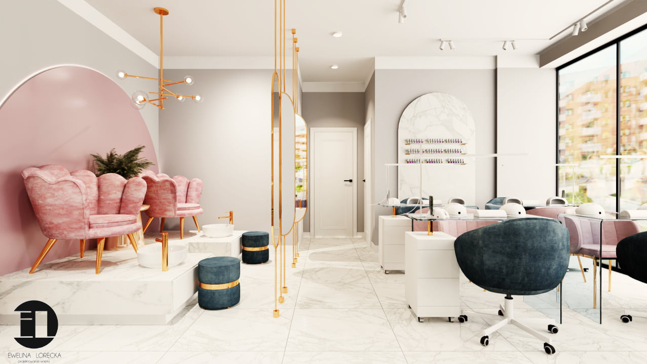 Nowoczesne wnętrze salonu kosmetycznego z różowymi fotelami, marmurowymi elementami i złotymi akcentami. Widoczne stanowiska do manicure i pedicure.
