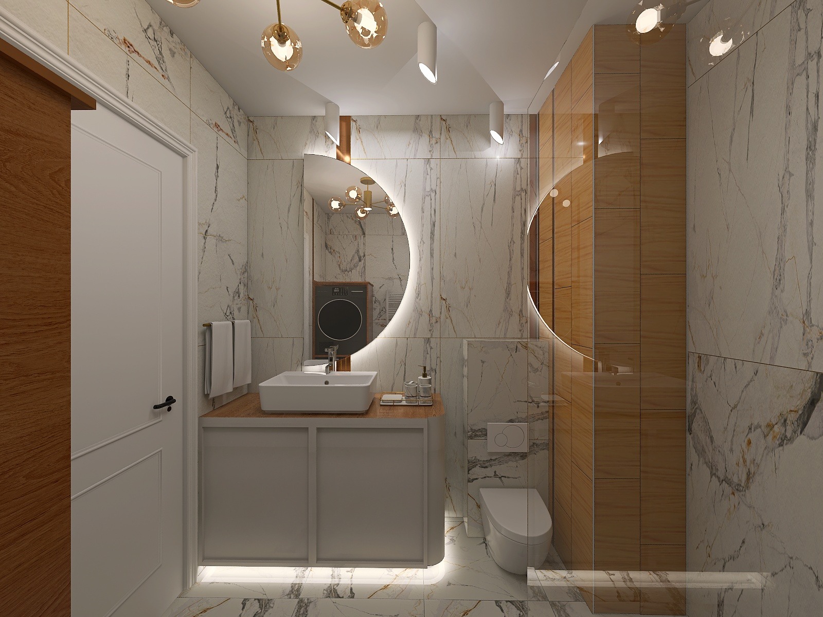 Nowoczesna łazienka z marmurowymi płytkami, okrągłym lustrem z podświetleniem LED i drewnianymi akcentami. Umywalka nablatowa, toaleta wisząca, pralka w zabudowie.