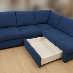 BMT TAPICER Patryk Kowalczuk - Narożnik z niebieską tapicerką i wysuwaną szufladą. Widoczne subtelne nóżki i drewniana podłoga. Nowoczesny design i praktyczne rozwiązanie do przechowywania.