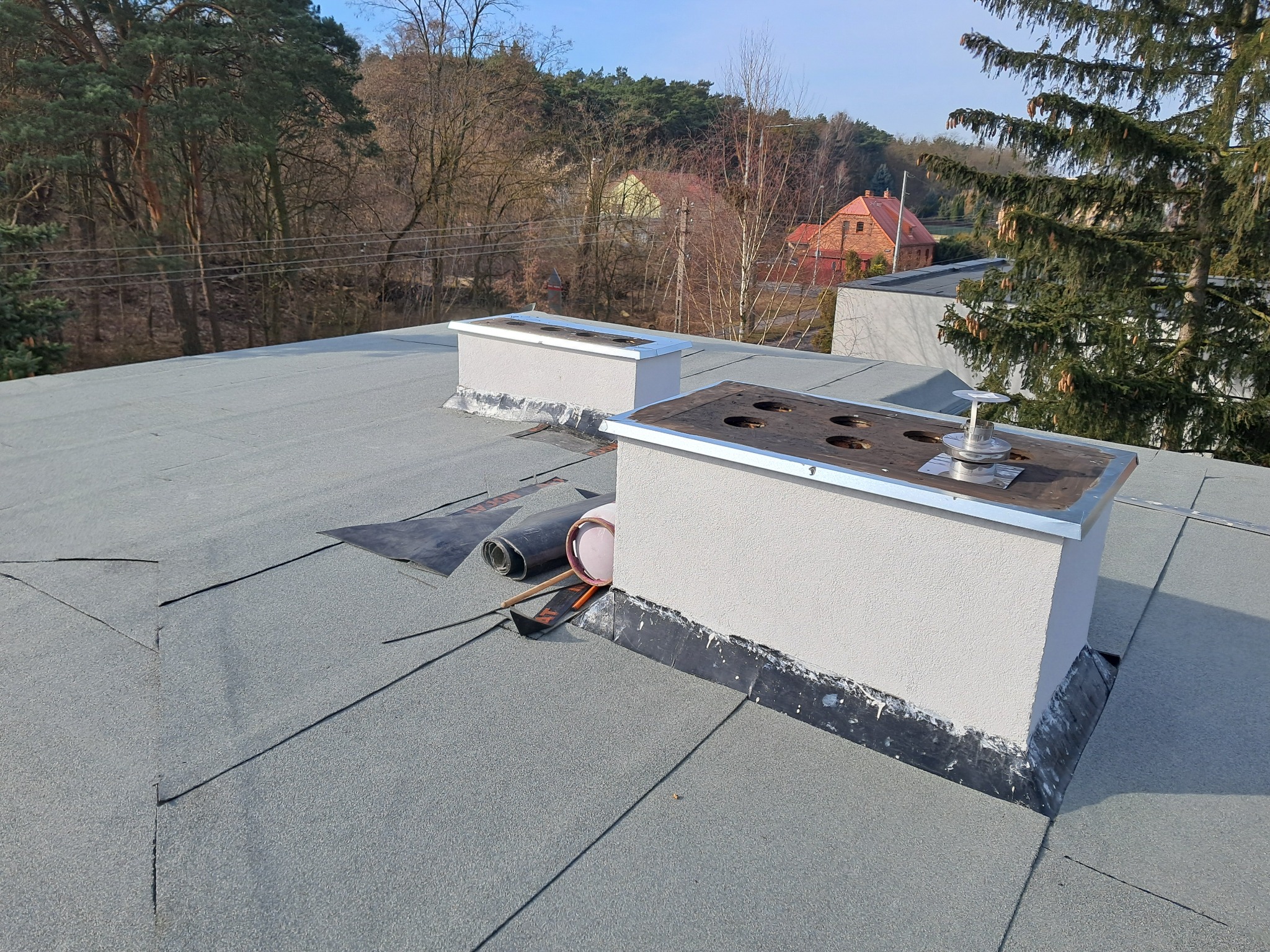 zdjęcie 4 pozostało wykonać obróbkę komina i wytopy