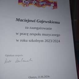 Dyplom za pracę przy szkolnym zespole muzycznym (opieka, realizacja koncertów) 