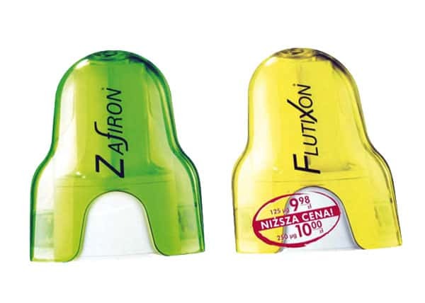 Dwie ulotki reklamowe leków: zielona Zafiron i żółta Flutixon, z widocznymi cenami promocyjnymi na białym tle. Detaliczne materiały promocyjne.