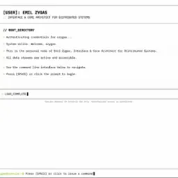 Interfejs użytkownika w stylu terminala z informacjami o użytkowniku Emil Zygas, architekcie systemów rozproszonych. Widoczny wiersz poleceń i komunikat 'LOAD_COMPLETE'.