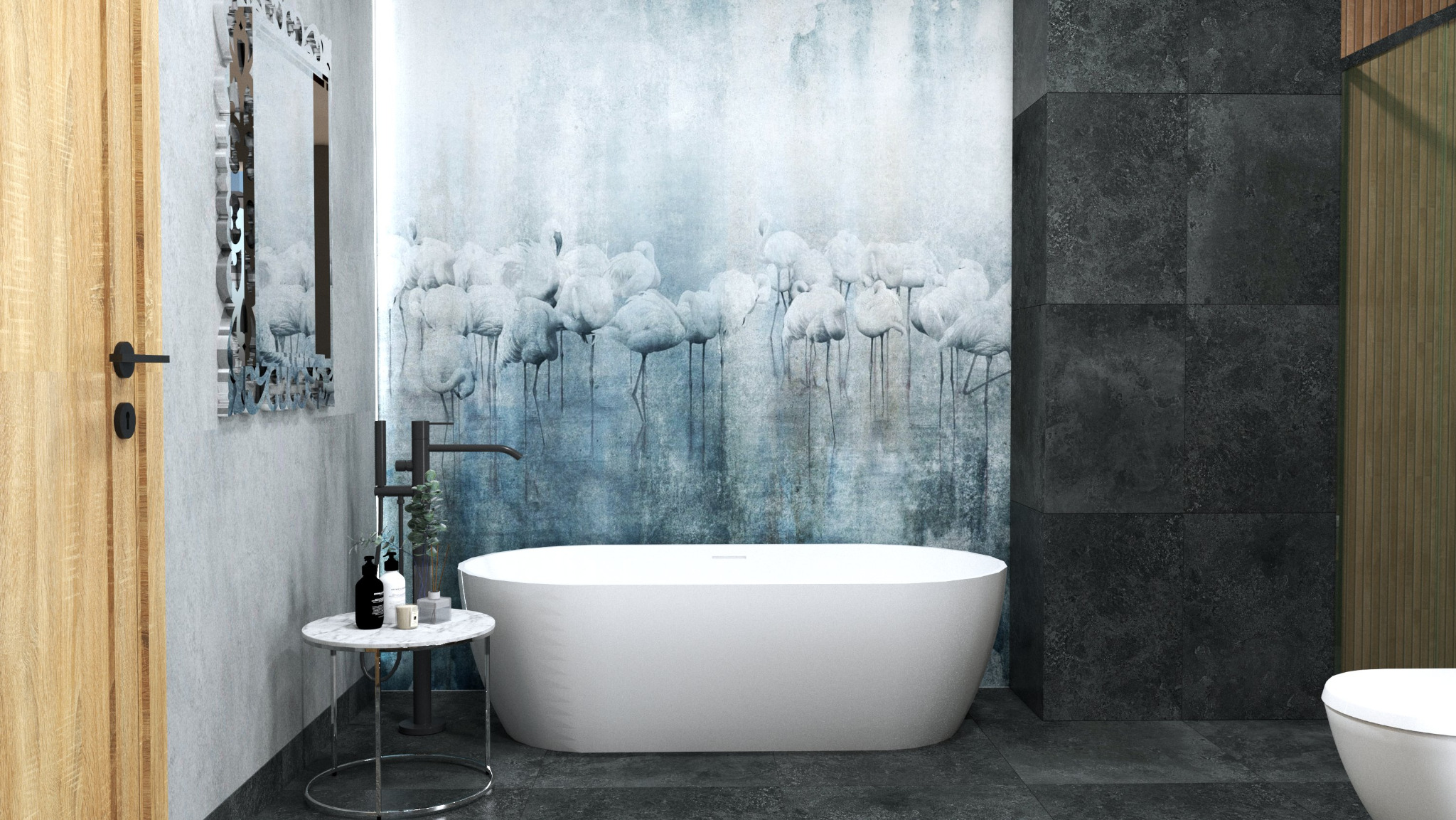 Nowoczesna łazienka z wolnostojącą wanną na tle ściany z motywem flamingów. Marmurowy stolik z kosmetykami i dekoracyjne lustro dodają elegancji.