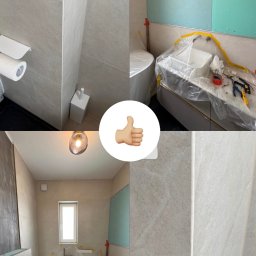 NBbud - Remont łazienki: ułożone płytki, zabezpieczone elementy, płyta GK na ścianie. Widok na fragmenty wnętrza w trakcie prac wykończeniowych.